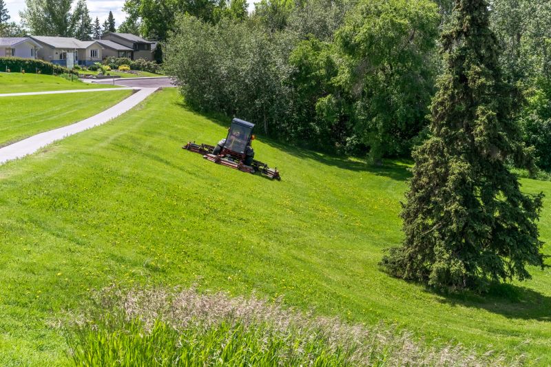 Local Steep Slope Mowing pros at work